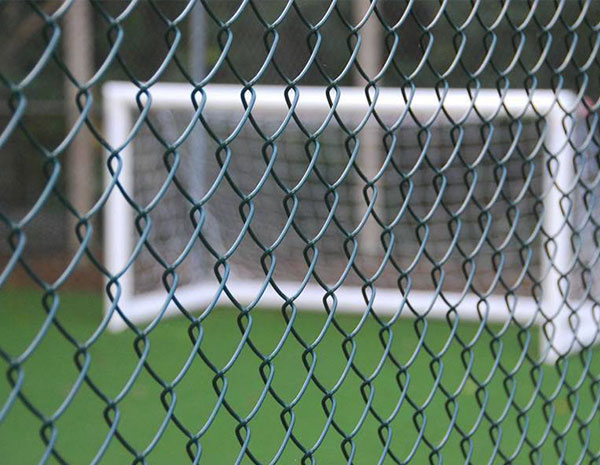 Why is the stadium fence made of chain link fence?